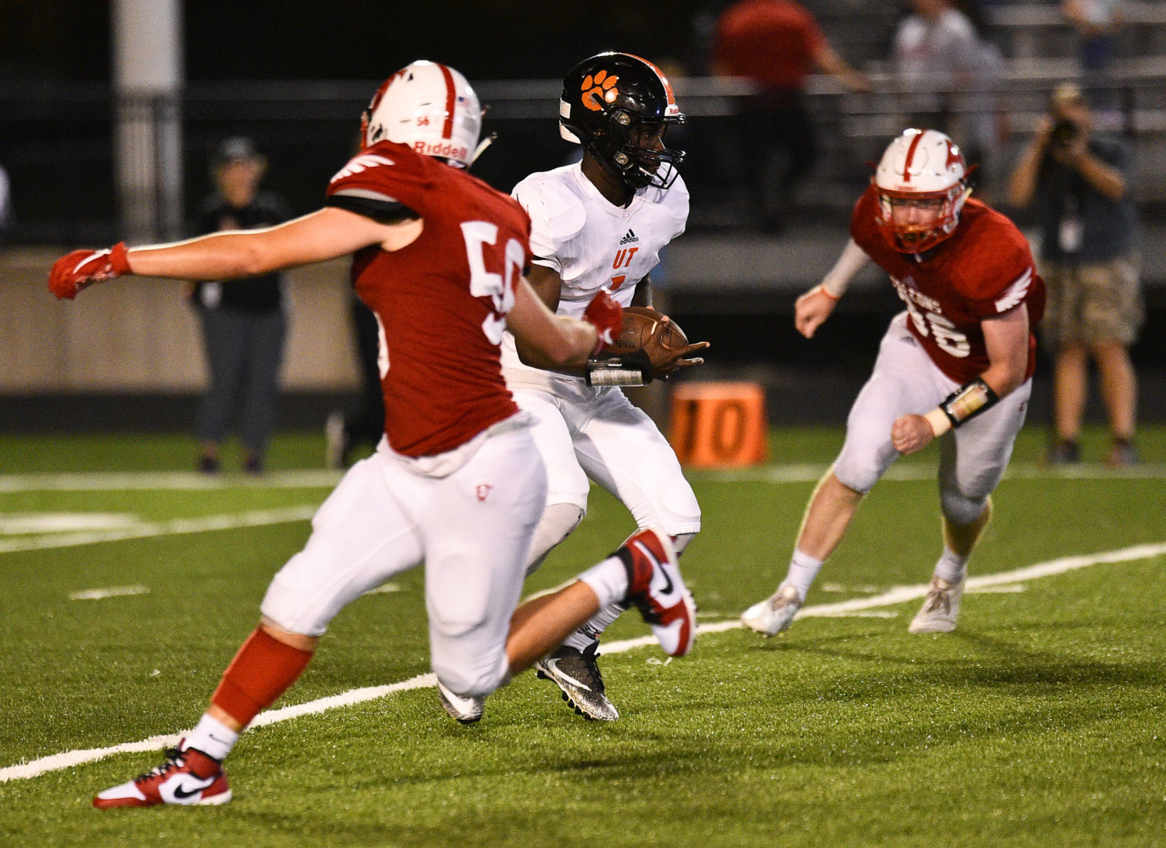 083019-qct-spt-ut-west-football-168a.jpg